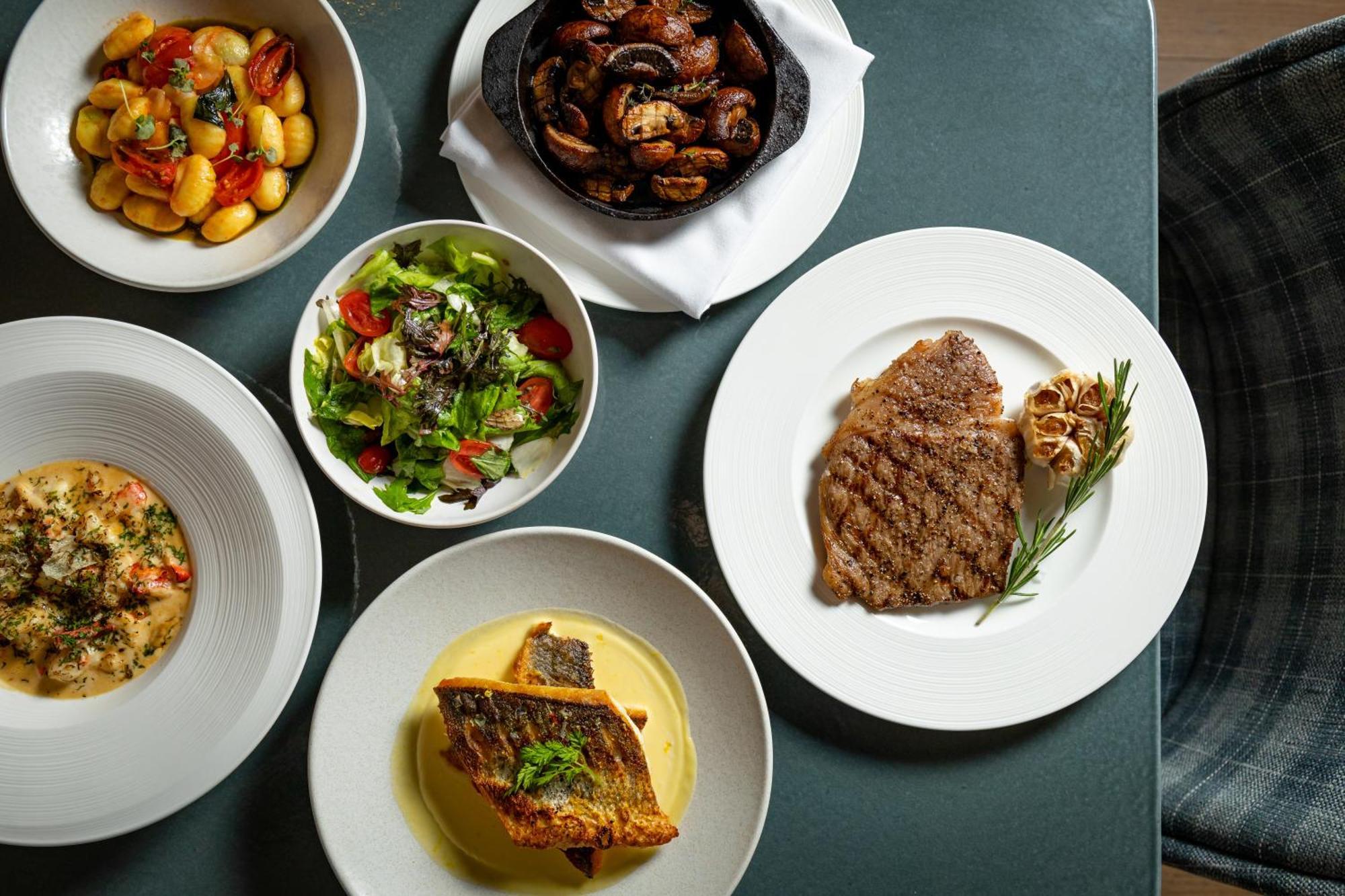 Hotel The Londoner Zewnętrze zdjęcie A selection of dishes at the restaurant